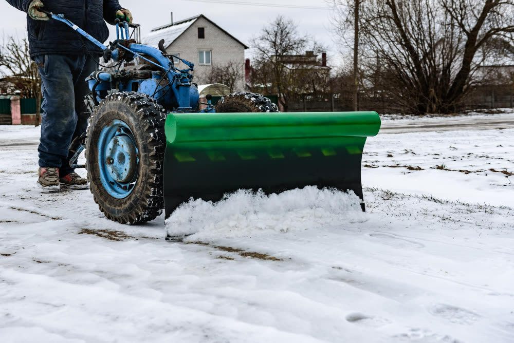 Clearing snow from a residential driveway